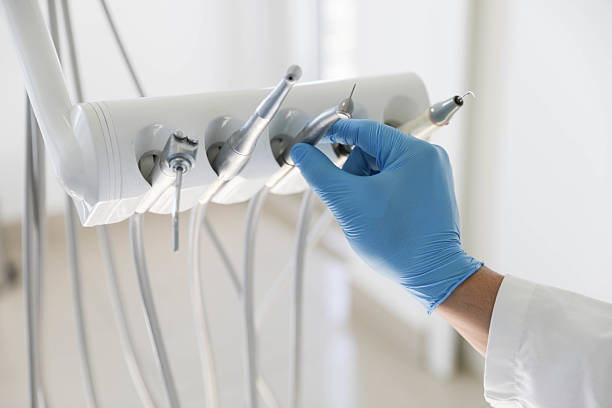 Professional Root Canal Treatment technician working in Keego Harbor, MI